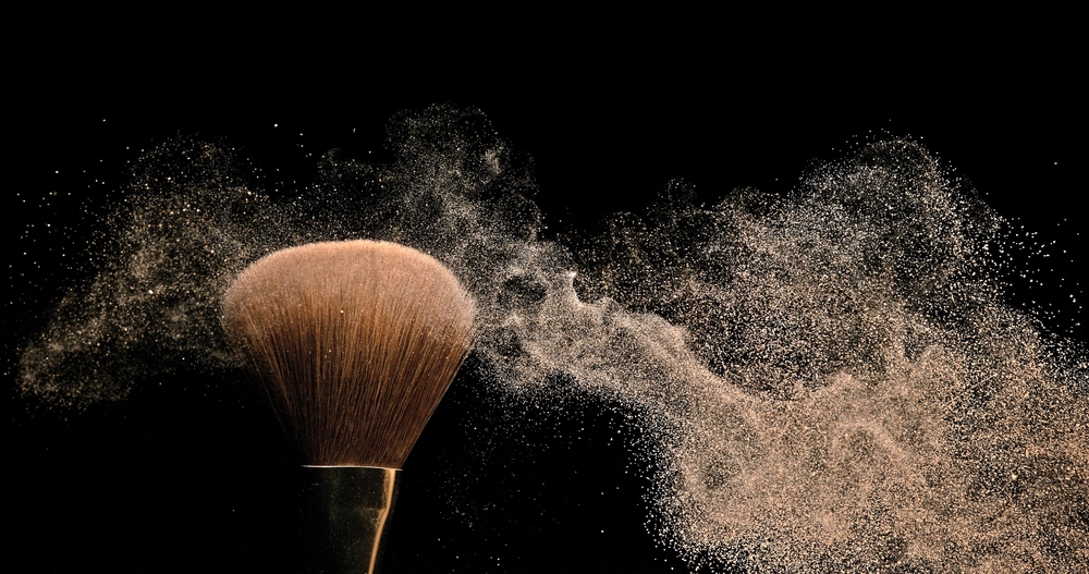 Make-up,Brush,Spreading,Blush,Powder,On,Black,Background
